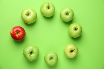 Ripe fresh apples on color background