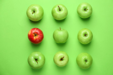 Ripe fresh apples on color background