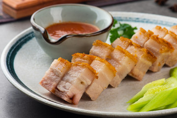 Siu Yuk or crispy roasted belly pork Chinese style