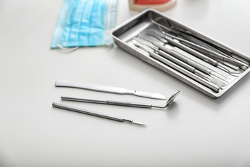 Dentist's tools on light table