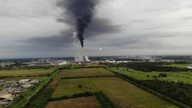Chemical Plant Conducting Controlled Flaring to Burn Off Excess Materials in Channelview near Houston, Texas Filmed by Drone