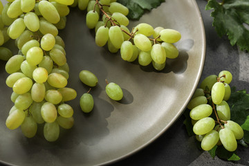 Fresh ripe juicy grapes on plate