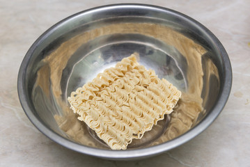 Instant noodles in a plate, junk food