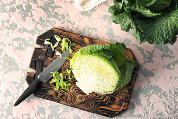 Cut savoy cabbage on wooden board