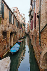 Narrow Venetian canal - Venice, Italy