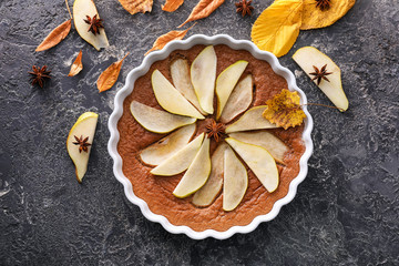 Delicious pear cake on grey table