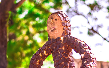 UNIQUE STATUE OF BOY MADE WITH THE COL DRINK CAPS