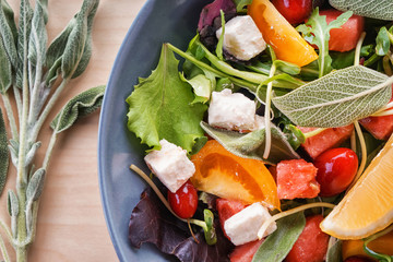 Delicious watermelon salad on plate, closeup