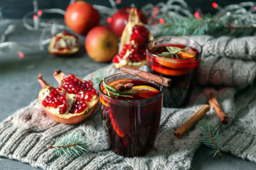 Glasses of delicious mulled wine on warm plaid
