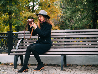 beautiful girl in a coat and in a hat