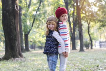 Children playing in autumn park