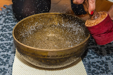 Tibetan handcrafted singing bowls. Tibetan sound massage.