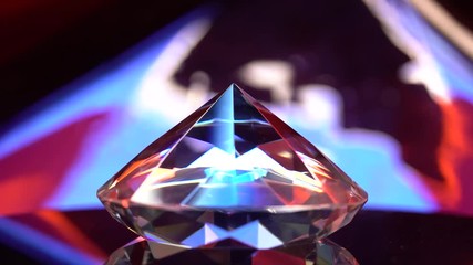 Diamond glows with highlights because it is multifaceted and transparent