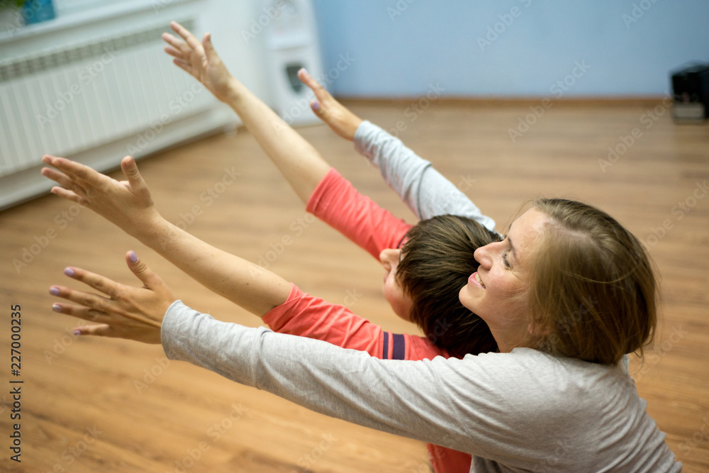 Wall mural Two women dancing dance contact improvisation