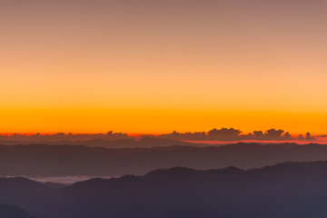 Obraz premium Dramatic sunset and sunrise over mountain morning twilight evening sky.