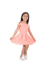 holding the tip of the dress