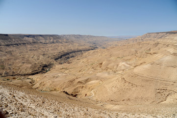 Fototapeta na wymiar panoramic view from the King's Highway, which swoops over the high ridge of the Great Rift Valley. in Jordan