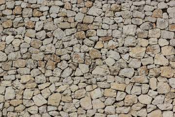Background wall of yellow gray stones