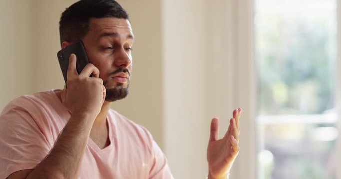 4K Casual business entrepreneur having a stressful disagreement over the phone