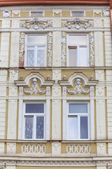 Obraz premium Fragments of facade of an Art Nouveau tenement house located on eastern frontage of Old Market Square in Przemysl, Poland 