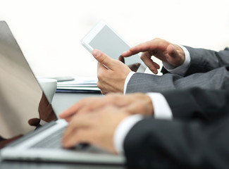 closeup.businessman working on laptop