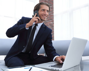 confident businessman in his office.