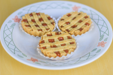 Guava pie is a delicious dessert. Three pies inside the plate.