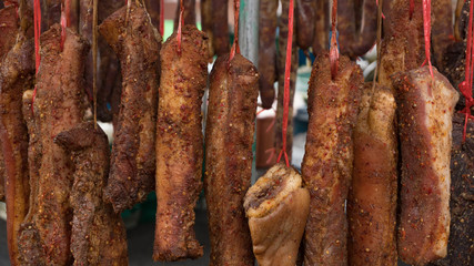 Dried pork hanging on the rail