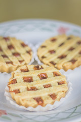 Guava pie is a delicious dessert. Three pies inside the plate.