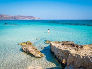 Papier Peint photo  Plage d'Elafonissi, Crète, Grèce Crete, Greece - Jul 14, 2018: Elafonisi, a paradise beach with turquoise water, an island located close to the southwestern corner of the Mediterranean island of Crete, known for its pink sand beaches