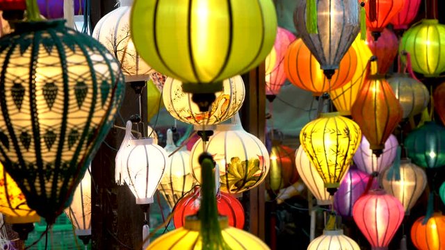 4K Video clip of traditional Vietnamese colorful lanterns at night on the streets of Hoi An, Vietnam
