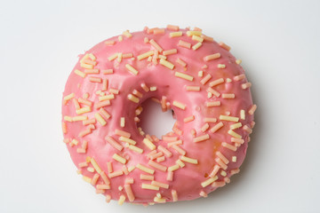 one donut on light background in minimal