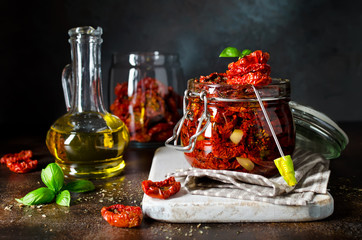 Sun-dried tomatoes with olive oil in a jar