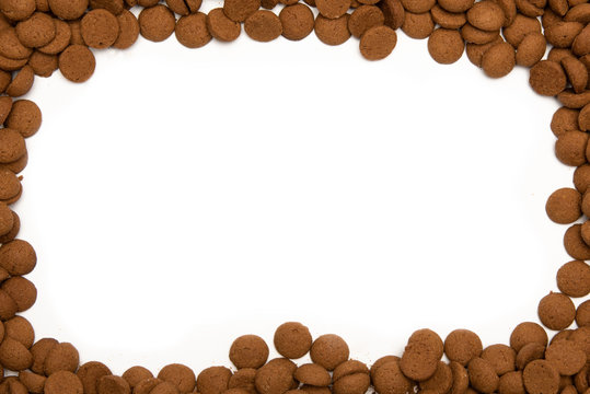Border Dutch Candy Pepernoten On White Background