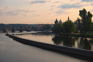 Picturesque view of the city Prague in morning. Charles Bridge over Vltava River and Archer's Island (Strelecky Island). Famous touristic place and travel destination in Europe. Prague,Czech Republic