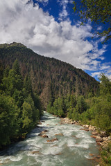 Mountain river with a rapid flow in the Caucasus Range ..