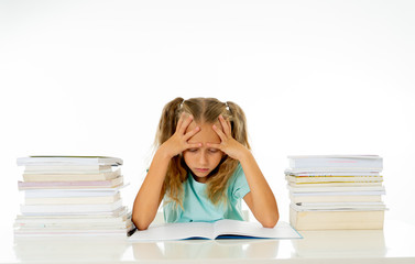 Sweet little schoolgirl feeling exhausted and stress by load of homework and schoolwork