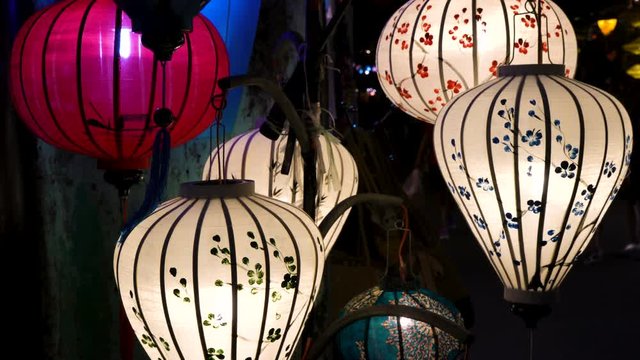 4K Video clip of traditional Vietnamese colorful lanterns at night on the streets of Hoi An, Vietnam