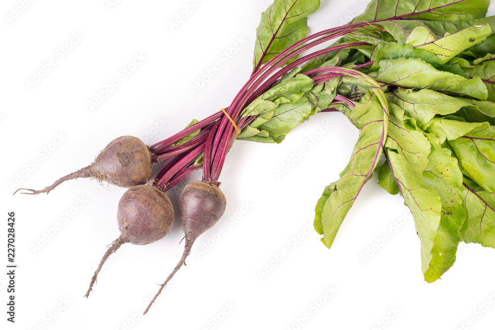 Wall mural bunch of organic healthy beetroot with leaves isolated