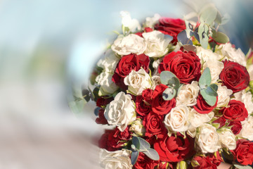 Wedding bouquet of red and white roses