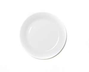 Empty ceramic round plate isolated on white. Isolated white plate top view