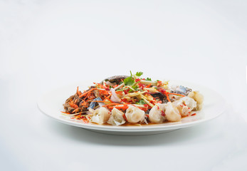 Thai style spicy salad with raw flower crab