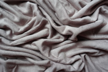 Folded simple grey viscose fabric from above