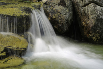 Fototapeta na wymiar waterfall on mountain stream