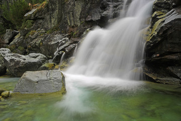 Fototapeta na wymiar cascade waterfall in Tatra mountains