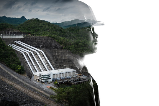 double exposure image of the engineer thinking during sunrise overlay with hydroelectricity image. the concept of clean energy, futuristic, industrial4.0 and hydroelectric.