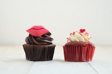 Love cupcakes with red heart and chocolate cream with red lip