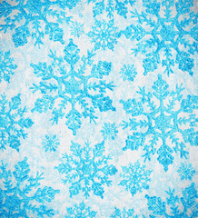 blue light background from snowflakes