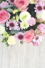 The composition of flowers on top.