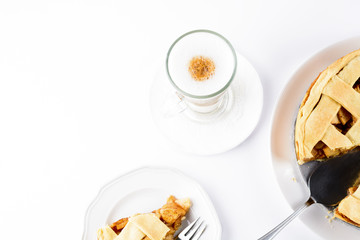 American apple pie with coffee Latte in glass Irish mug isolated on white background